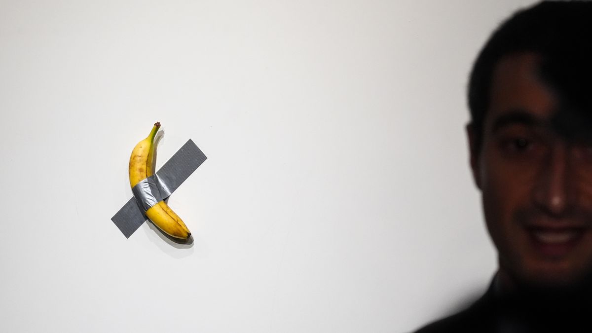 NEW YORK, NEW YORK - OCTOBER 25: Artist Maurizio Cattelan's "Comedian" is seen during a press preview for Sotheby's Evening Auction on October 25, 2024 in New York City. The conceptual piece, a banana duct-taped to a wall, went viral in 2019 and one of its three editions is estimated to sell for between $1 million to $1.5 million. (Photo by John Nacion/Getty Images)