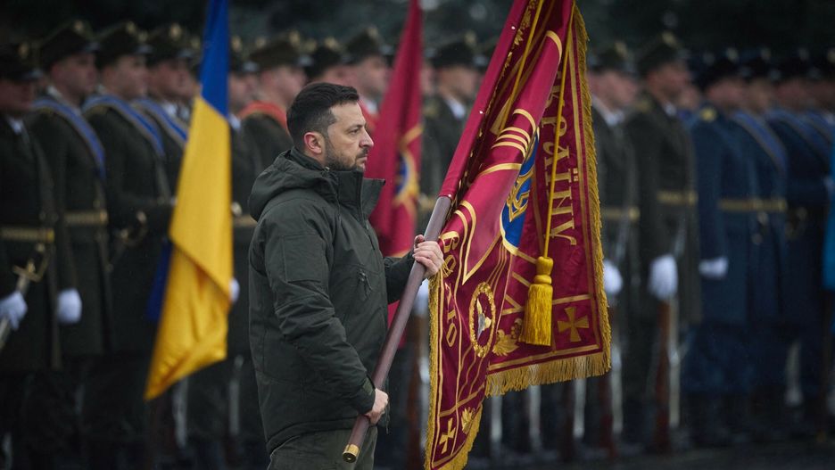 Temporary
This handout photograph taken and released by the Ukrainian Presidential press service on December 6, 2024, shows the President of Ukraine Volodymyr Zelensky presents battle flag  during the Events on Ukraine's Armed Forces Day in Kyiv, amid the Russian invasion in Ukraine. December 6, 2024 marks the 33th anniversary of the Armed Forces of Ukraine. (Photo by HANDOUT / UKRAINIAN PRESIDENTIAL PRESS SERVICE / AFP) / RESTRICTED TO EDITORIAL USE - MANDATORY CREDIT "AFP PHOTO /  Ukrainian Presidential press service " - NO MARKETING NO ADVERTISING CAMPAIGNS - DISTRIBUTED AS A SERVICE TO CLIENTS
HANDOUT