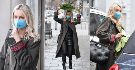 Agnieszka Woźniak-Starak ratuje fryzurę przed zmoknięciem za pomocą... kwiatów (ZDJĘCIA)