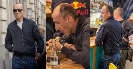 Dawno niewidziany Robert Kubica pałaszuje obiad w towarzystwie znajomego (ZDJĘCIA)