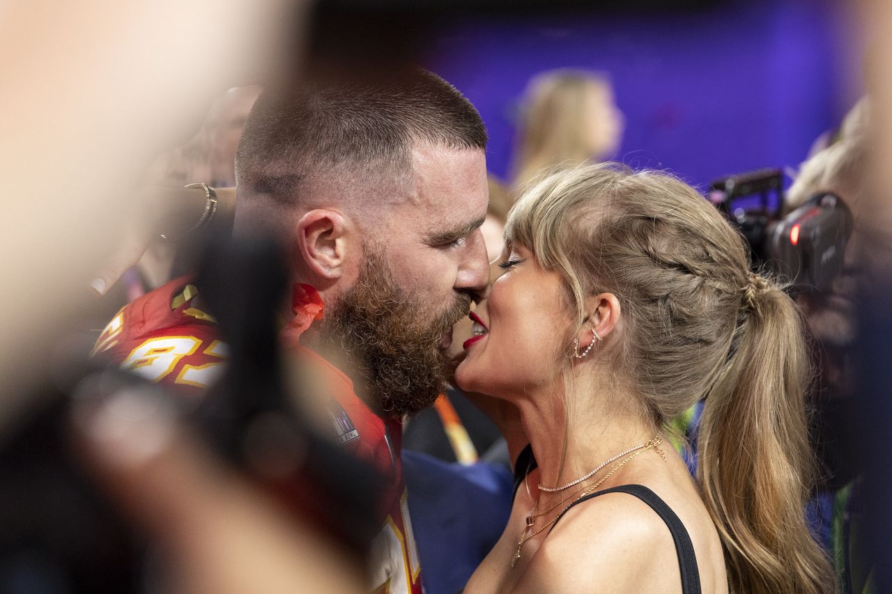 LAS VEGAS, NEVADA - FEBRUARY 11: Travis Kelce #87 of the Kansas City Chiefs and Taylor Swift kiss following the NFL Super Bowl 58 football game between the San Francisco 49ers and the Kansas City Chiefs at Allegiant Stadium on February 11, 2024 in Las Vegas, Nevada. (Photo by Michael Owens/Getty Images)