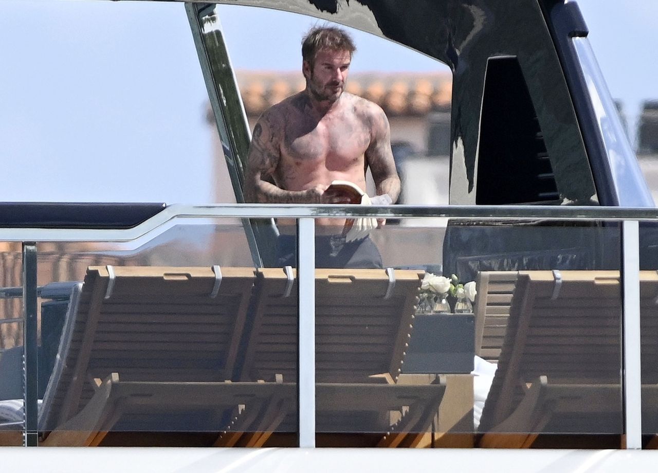 Victoria and David Beckham are lounging on a luxurious yacht.