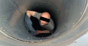 Gruzin próbował wkraść się do warsztatu przez szyb wentylacyjny. Zaczął krzyczeć, gdy zrozumiał, że utknął