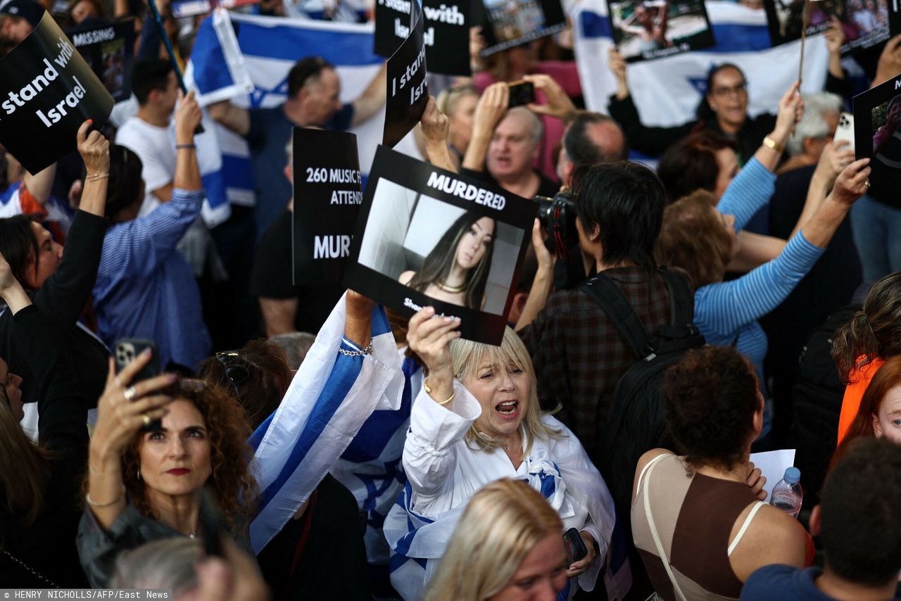 A participant of the demonstration in support of Israel holds a photo of the kidnapped Shani Louk.