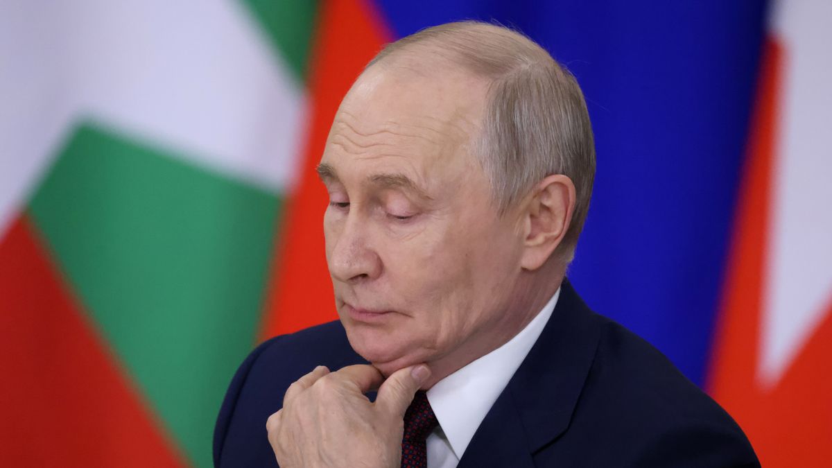 MOSCOW, RUSSIA - AUGUST 18: Russian President Vladimir Putin pinches his neck during a Russian-Myanmar meeting at Kremlin on August 18, 2026 in Moscow, Russia. Fresh off a five-year military deal, Min Aung Hlaing is meeting Vladimir Putin for talks on further economic and security cooperation. (Photo by Contributor/Getty Images)