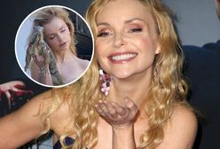 Zapozowała nago. Zasłoniła się jedynie legwanem