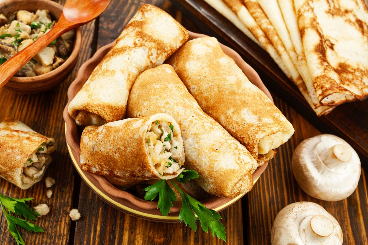 Crepes with mushroom and cheese filling