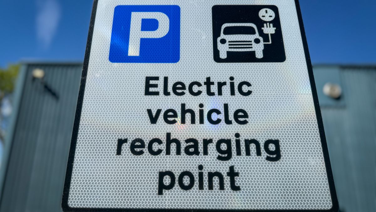 BATH, UNITED KINGDOM - APRIL 28: A electric vehicle charging point sign is displayed in a city centre car park, on April 28, 2024 in Bath, England. The government's commitment to reducing future Co2 carbon emissions will mean many more motorists will need to switch from petrol and diesel powered cars to electric (EV) driven ones. However there are also fears that the charging network in the UK is not yet fit to deal with the enormous demand more EVs on the road would place on it.(Photo by Matt Cardy/Getty Images)