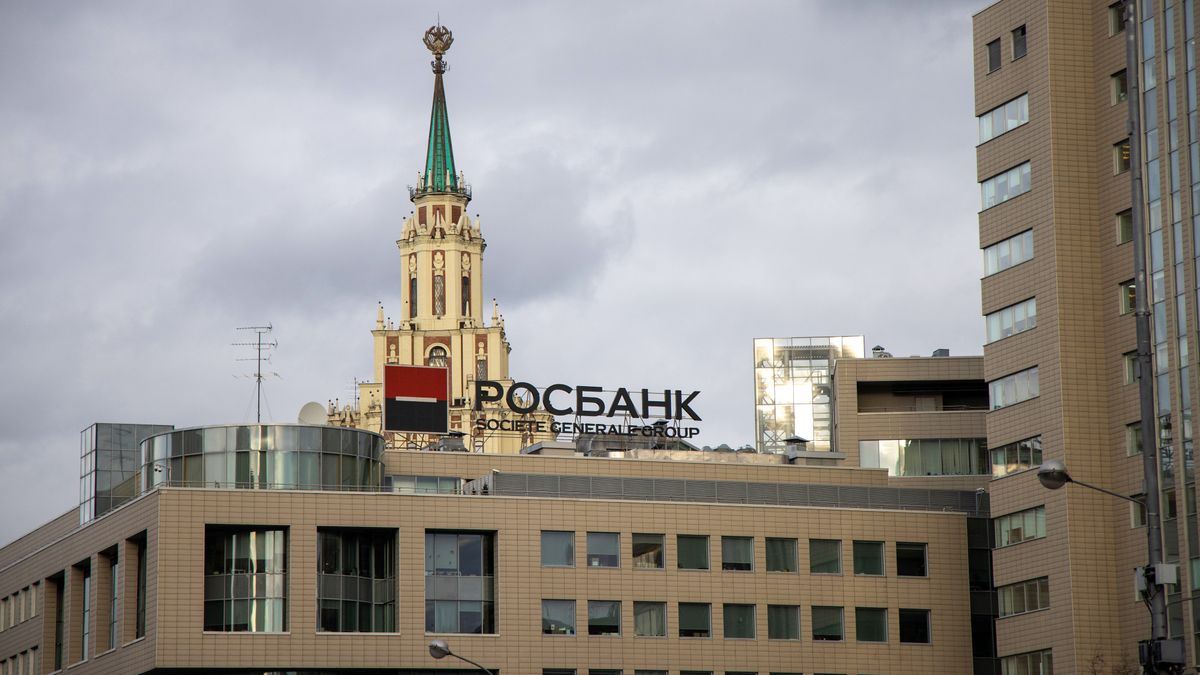 A sign on the roof of a Rosbank PJSC building, a unit of Societe Generale Group, in Moscow, Russia, on Tuesday, Feb. 22, 2022. The ruble tumbled the most since March 2020 after President Vladimir Putin recognized self-declared separatist republics in east Ukraine, deepening a standoff with the West. Photographer: Andrey Rudakov/Bloomberg via Getty Images
