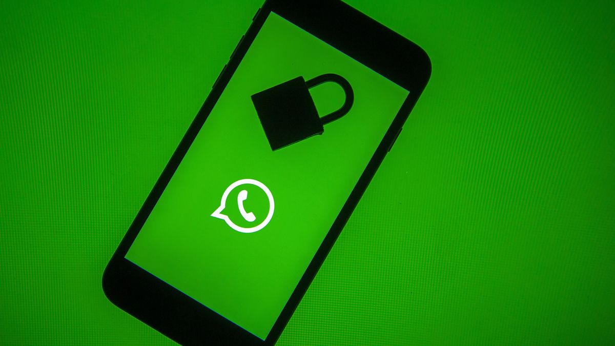 ANKARA, TURKEY - DECEMBER 10: WhatsApp logo is seen displayed on a smart phone screen with a padlock on it, in this illustration photo taken in Ankara, Turkey on December 10, 2019. (Photo by Ali Balikci/Anadolu Agency/Getty Images)