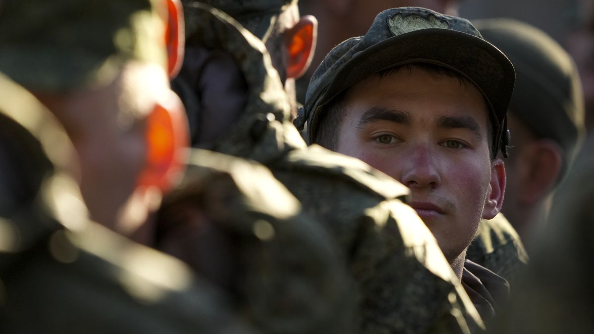 MOSCOW, RUSSIA - OCTOBER 10: Russian citizens drafted during the partial mobilization are seen being dispatched to combat coordination areas after a military call-up for the Russia-Ukraine war in Moscow, Russia on October 10, 2022. (Photo by Stringer/Anadolu Agency via Getty Images)