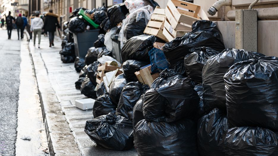 Household waste containers and rubbish dumps continue to pile up on the pavements of Paris streets on 14 March 2023 since garbage collectors went on strike against the French government's pension reform bill on 6 March 2023. (Photo by Samuel Boivin/NurPhoto via Getty Images)