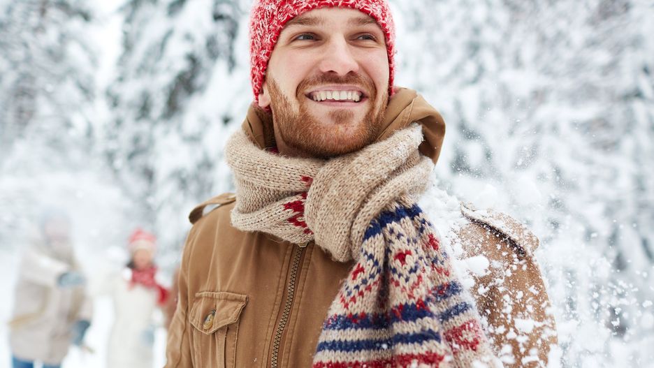 Young manHappy guy in winterwear on background of his friendspeople, portrait, winter, outside, man, woman, happy, December, January, February, seasonal, adult, young, smiling, toothy, winterwear, handsome, snow, friendly, knitted, scarf, jacket, casual-wear, Caucasian, unshaven
