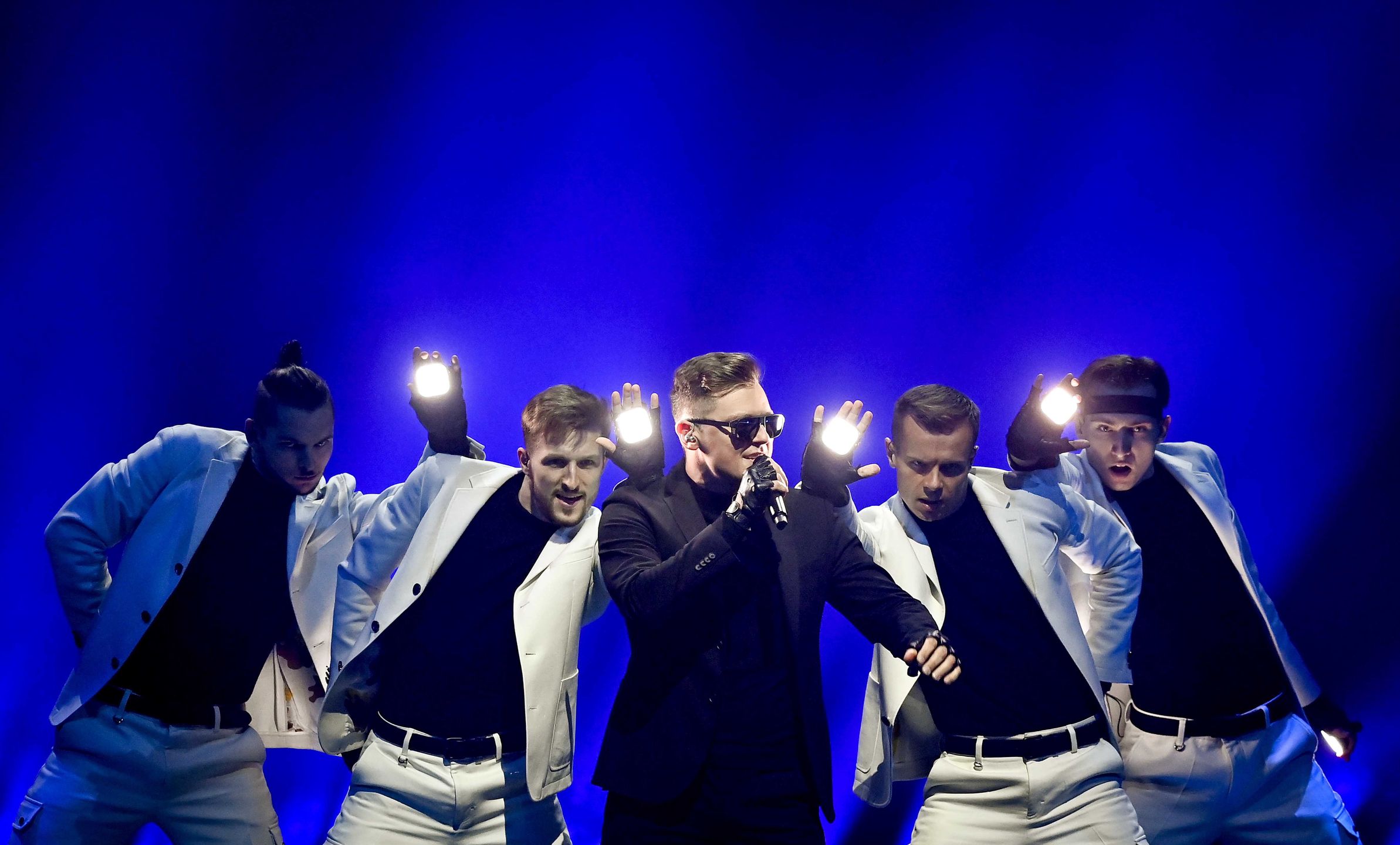 epa09211858 RAFAL from Poland with the song 'The Ride' performs during the first dress rehearsal for the Second Semi-Final of the 65th annual Eurovision Song Contest (ESC) at the Rotterdam Ahoy arena, in Rotterdam, The Netherlands, 19 May 2021. Due to the coronavirus (COVID-19) pandemic, only a limited number of visitors is allowed at the 65th edition of the Eurovision Song Contest (ESC2021) that is taking place in an adapted form at the Rotterdam Ahoy and consist of two semi-finals, on 18 and 20 May 2021, and a grand final on 22 May 2021.  EPA/Patrick van Emst / POOL *** Local Caption *** 50359766 Dostawca: PAP/EPA.