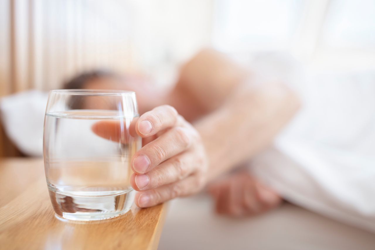 Why not leave a glass by the bed?