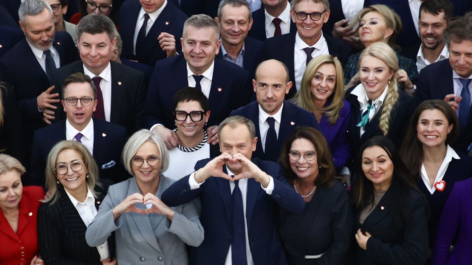 WARSAW, POLAND - DECEMBER 11: Civic Platform leader Donald Tusk poses for a photo with the party parliament members after the Parliament session in Warsaw, Poland on December 11, 2023. The majority of Parliament has voted for Donald Tusk as the new Prime Minister. (Photo by Jakub Porzycki/Anadolu via Getty Images)