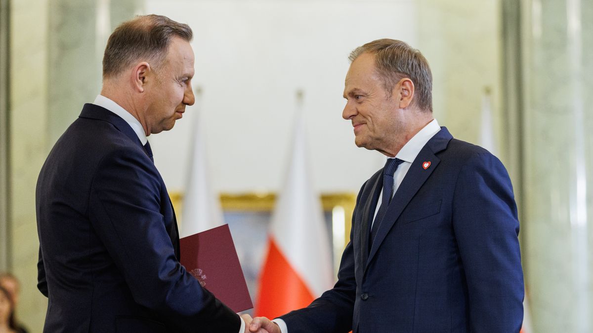 Polish President Duda attends the sworn in ceremony at Donald Tusk's CabinetWARSAW, POLAND - DECEMBER 13: Polish President Andrzej Duda (L) and the Polish Prime Minister Donald Tusk (R) shake hands at the sworn in ceremony during Donald Tusk's government at the Presidential Palace in Warsaw, Poland on December 13, 2023. (Photo by Stringer/Anadolu via Getty Images)Anadolueu, new cabinet, parliament, party, political, pro eu