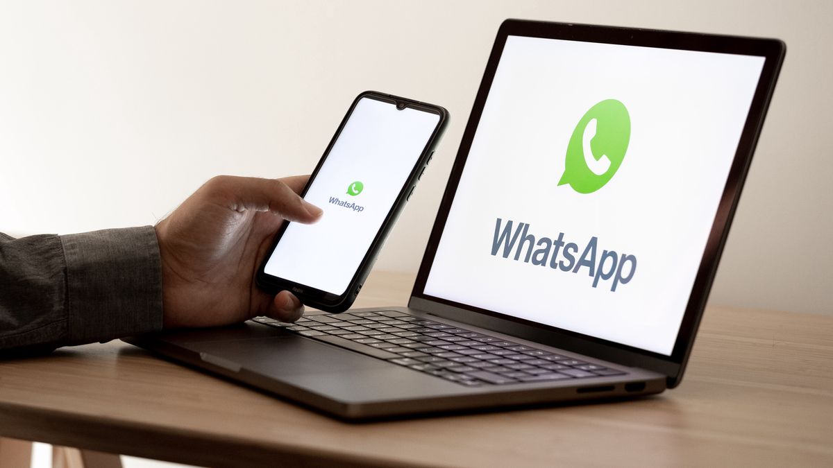 The WhatsApp logo appears on a smartphone screen and on a laptop computer screen in this photo illustration in Athens, Greece, on September 17, 2025. (Photo by Nikolas Kokovlis/NurPhoto via Getty Images)