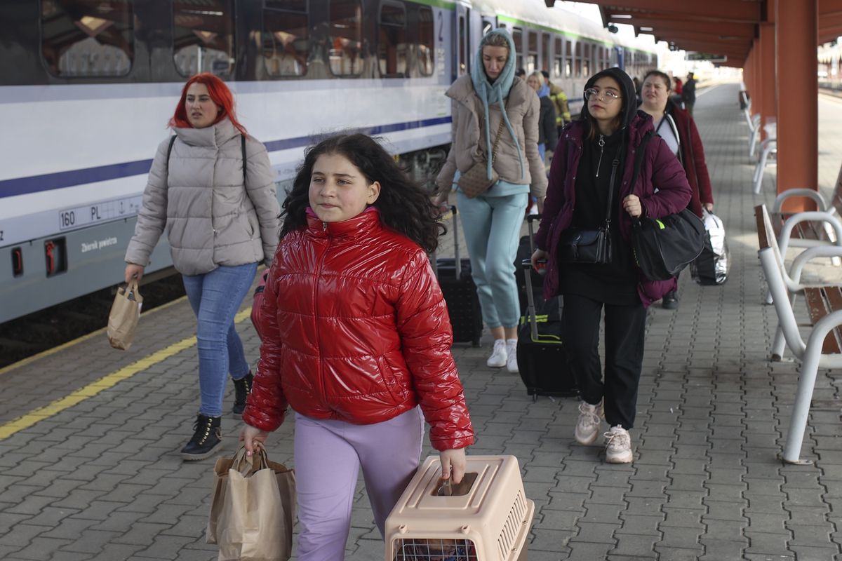 PRZEMYSL, POLAND - APRIL 3: Ukrainian civilians fleeing from their country due to ongoing Russia's attacks on Ukraine, continue to arrive by train in Przemysl, Poland on April 3, 2022. From here Ukrainians go to other cities of Poland. (Photo by Ayhan Mehmet/Anadolu Agency via Getty Images)