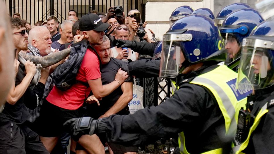 'Enough is Enough' protest
Police officers clash with protesters during the 'Enough is Enough' protest in Whitehall, London, following the fatal stabbing of three children at a Taylor Swift-themed holiday club on Monday in Southport. Picture date: Wednesday July 31, 2024. (Photo by Jordan Pettitt/PA Images via Getty Images)
Jordan Pettitt - PA Images