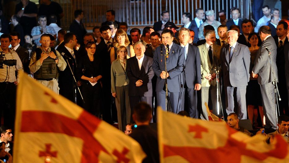 Russian Troops Ordered To Withdraw Following Conflict With GeorgiaTBILISI, GEORGIA - AUGUST 12: (TURKEY OUT) (L-R) President Lech Kaczynski of Poland, President Viktor Yushchenko of Ukraine, President Valdas Adamkus of Lithuania and President Toomas Hendrik Ilves of Estonia show support for Georgia by appearing on stage with President Mikheil Saakashvili (2L) of Georgia in front of a large crowd August 12, 2008 in Tbilisi, Georgia. Thousands of protesters cheered President Mikheil Saakashvili outside Georgia's parliament, backing him in Georgia's confrontation with Russia over the breakaway region of South Ossetia. (Photo by Burak Kara/Getty Images)Burak Karacaucuses, conflict, georgia, georgian, government, political, politician, politics, russia, russian, war