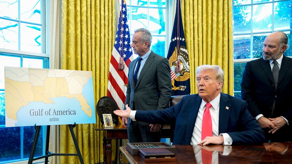 Robert F. Kennedy Jr., US secretary of Health and Human Services (HHS), from left, US President Donald Trump, and Howard Lutnick, US commerce secretary, look toward a "Gulf of America" sign during an executive order signing in the Oval Office of the White House in Washington, DC, US, on Tuesday, Feb. 25, 2025. Trump signed an executive action directing the Commerce Department to examine possible copper tariffs, the latest in a string of measures aimed at imposing sector-specific levies that offer to reshape global supply chains. Photographer: Yuri Gripas/Abaca/Bloomberg via Getty Images