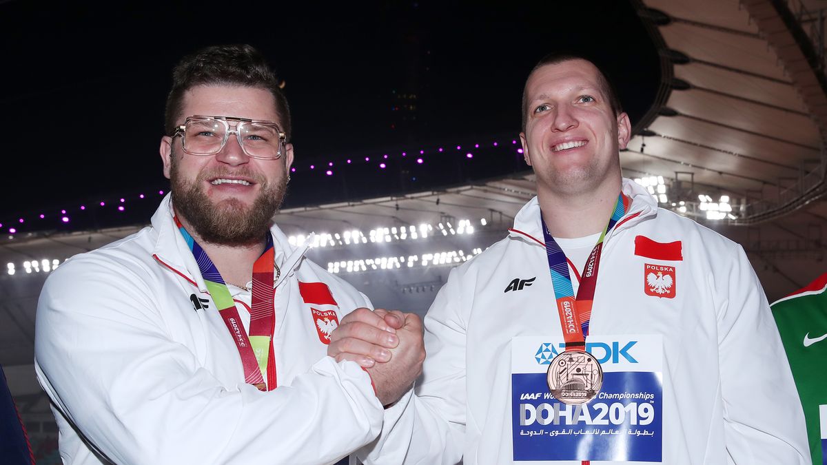DOHA, QATAR - OCTOBER 03: Paweł Fajdek of Poland, gold, and Wojciech Nowicki of Poland, bronze, pose during the medal ceremony for Men's Hammer Throw during day seven of 17th IAAF World Athletics Championships Doha 2019 at Khalifa International Stadium on October 03, 2019 in Doha, Qatar. (Photo by Christian Petersen/Getty Images)