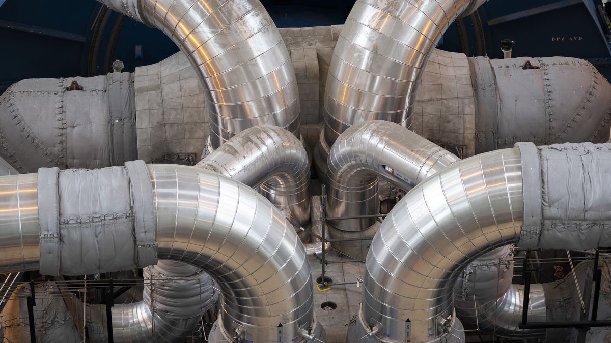 Turbine pipes in the engine room at the Flamanville 3 nuclear reactor, operated by Electricite de France SA (EDF), in Flamanville, France, on Thursday, April 25, 2024. The Flamanville 3 European pressurized water reactor (EPR) has been approved of its first fuel loading and is ready to begin operation. Photographer: Nathan Laine/Bloomberg via Getty Images