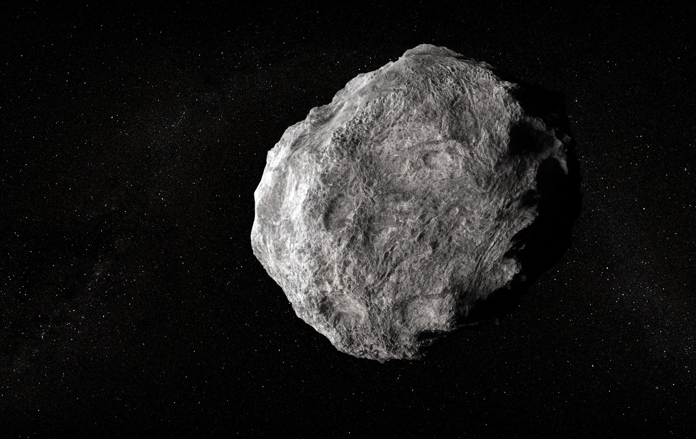 Duży meteoryt w kosmosie - zdjęcie ilustracyjne.