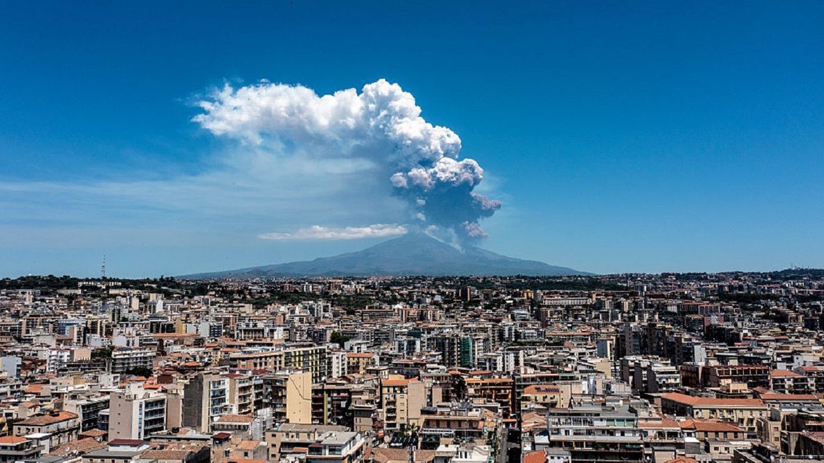 Mount Etna EruptsCATANIA, ITALY - JUNE 02: Mount Etna exhibits a Strombolian eruption, with a volcanic plume rising from the southeast crater, on June 02, 2025 in Catania, Italy. An orange aviation warning has been issued. The images show aerial views of the volcano with the city of Catania in the background. (Photo by Fabrizio Villa/Getty Images)Fabrizio Villabestof, topix