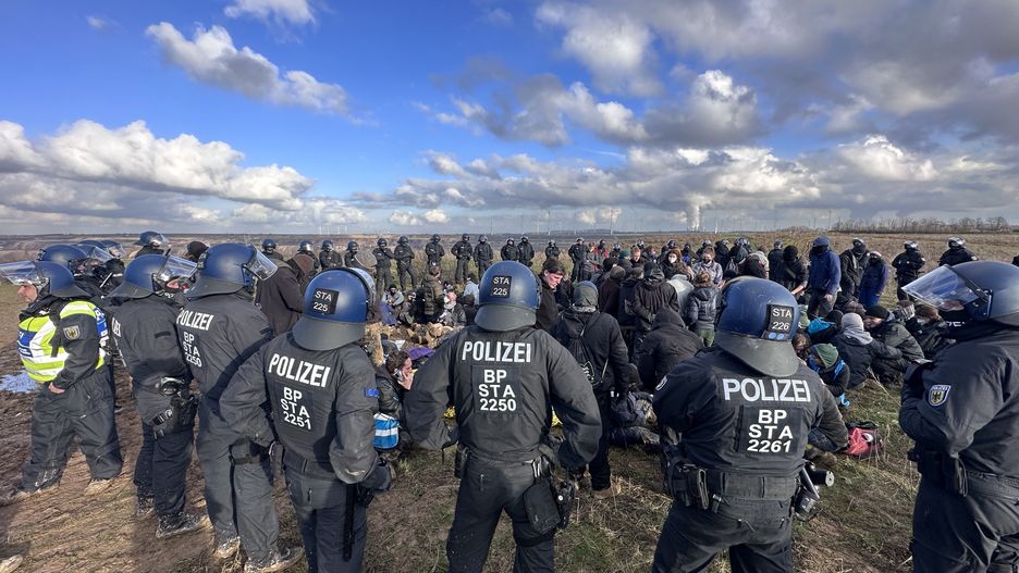 LUTZERATH, GERMANY - JANUARY 17: Police take security measures as Swedish activist Greta Thunberg visits the site to show her support for environment activists protesting against a plan expanding the Garzweiler coal mine in the village of Lutzerath in western Germany on January 17, 2023. (Photo by Kadir Ilboga/Anadolu Agency via Getty Images)