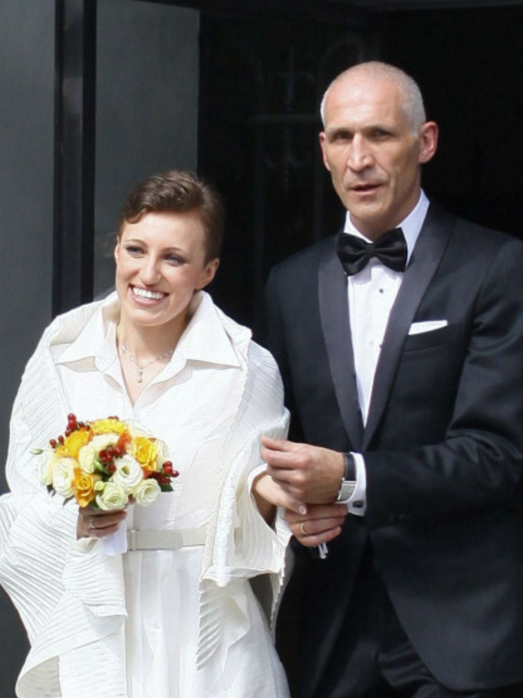 Maciej Szczęsny z żoną podczas ślubu 