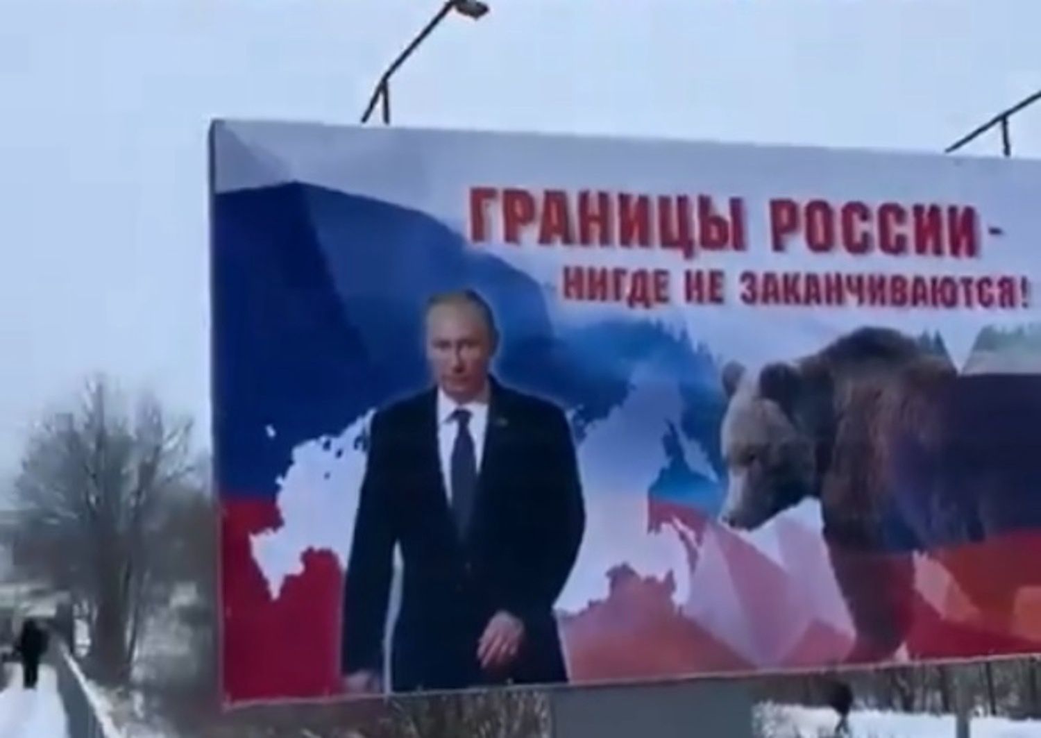 Provoking the Russians.  A banner with Putin appeared on the border