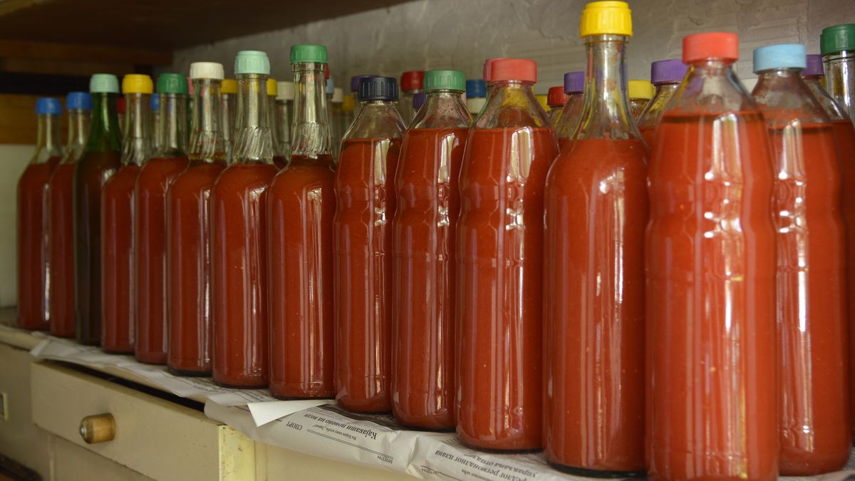 tomato juice in glass bottles close upbottles of tomato juiceJana Milin