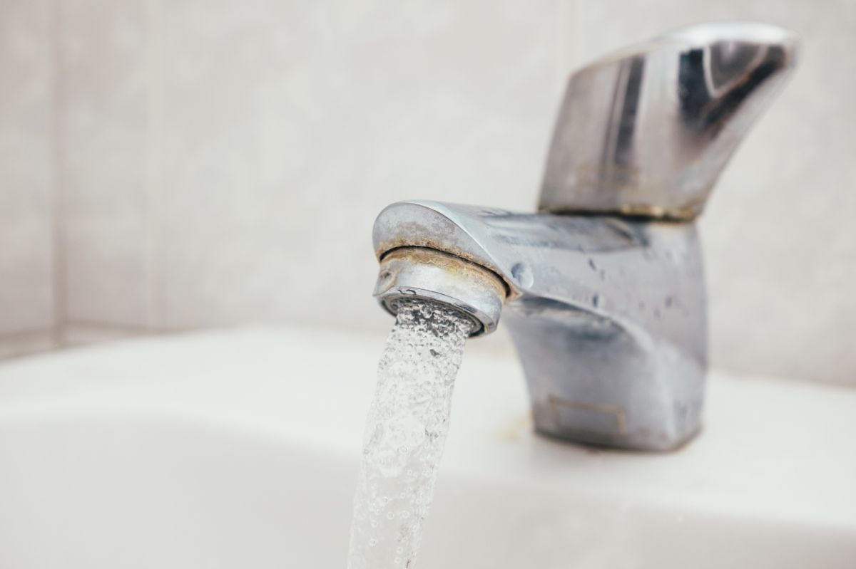 Wipe the tap. You will get rid of the limescale.