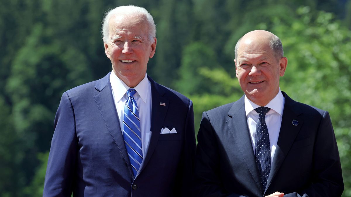 US President Joe Biden, left, welcomed by Olaf Scholz, Germany's chancellor, on the first day of the Group of Seven (G-7) leaders summit at the Schloss Elmau luxury hotel in Elmau, Germany, on Sunday, June 26, 2022. Issues on Sunday's formal agenda include the global economy, infrastructure and investment and foreign and security policy, while a number of bilateral meetings are also planned. Photographer: Liesa Johannssen-Koppitz/Bloomberg via Getty Images