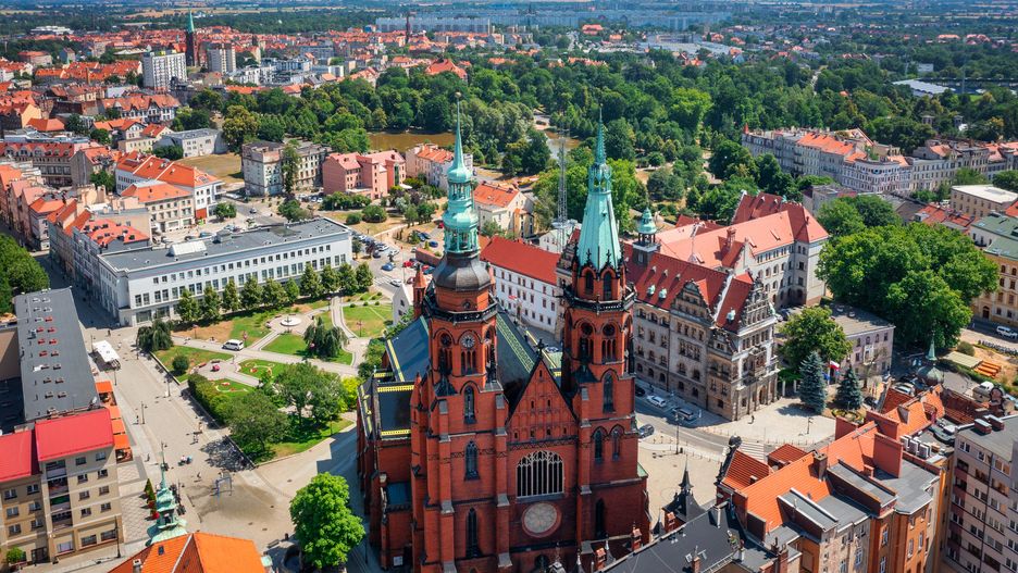 Beautiful architecture of the Legnica city in Lower Silesia, Poland
legnica, architecture, aerial, poland, street, church, city, silesia, tenement, old town, travel, destination, lawn, blooming, flowers, scenery, european, basilica, town, cathedral, europe, landmark, cityscape, polish, urban, history, downtown, old, gothic, brick, blue sky, square, catholic, peter and paul, colorful, promenade, polska, lower silesia, saint, historic, tower, day, view, summer, building, tourism, historical, exterior