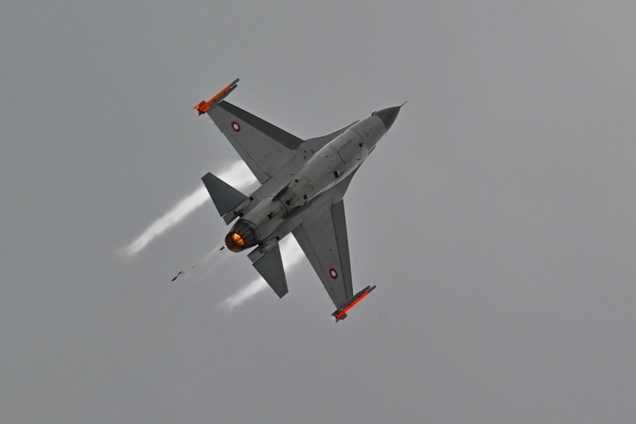 FARNBOROUGH, UNITED KINGDOM - JULY 26: A Royal Danish Air Force F-16 aircraft performs a demonstration flight during the fifth day of Farnborough International Airshow at Farnborough International Exhibition & Conference Centre in Farnborough, United Kingdom on July 26, 2024. The 5-day event, located southwest of London at an airport typically used for private jets, is expected to attract some 75,000 visitors and 1,200 exhibitors. (Photo by Rasid Necati Aslim/Anadolu via Getty Images)