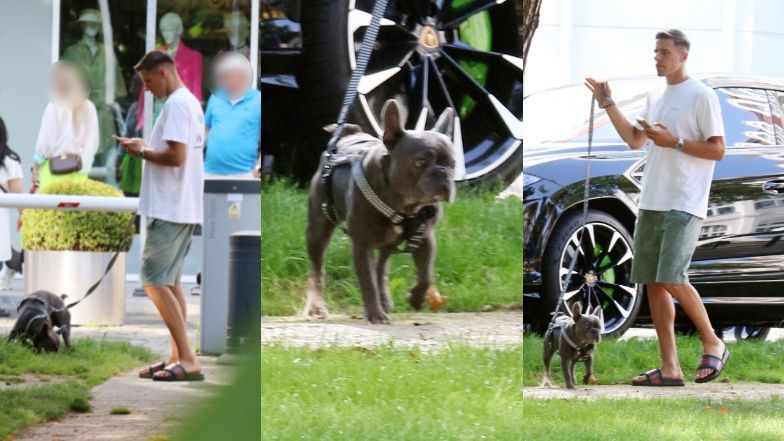 Jan Bednarek spaceruje z żoną po Sopocie i sprząta po psie
