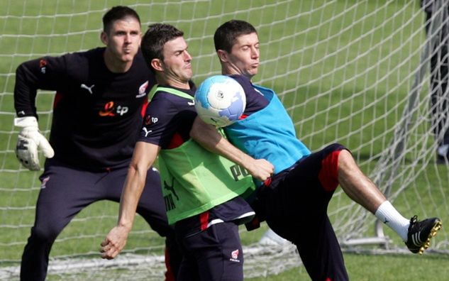 Michał Żewłakow i Robert Lewandowski podczas pierwszego zgrupowania "Lewego" / fot. PAP/Adam Ciereszko