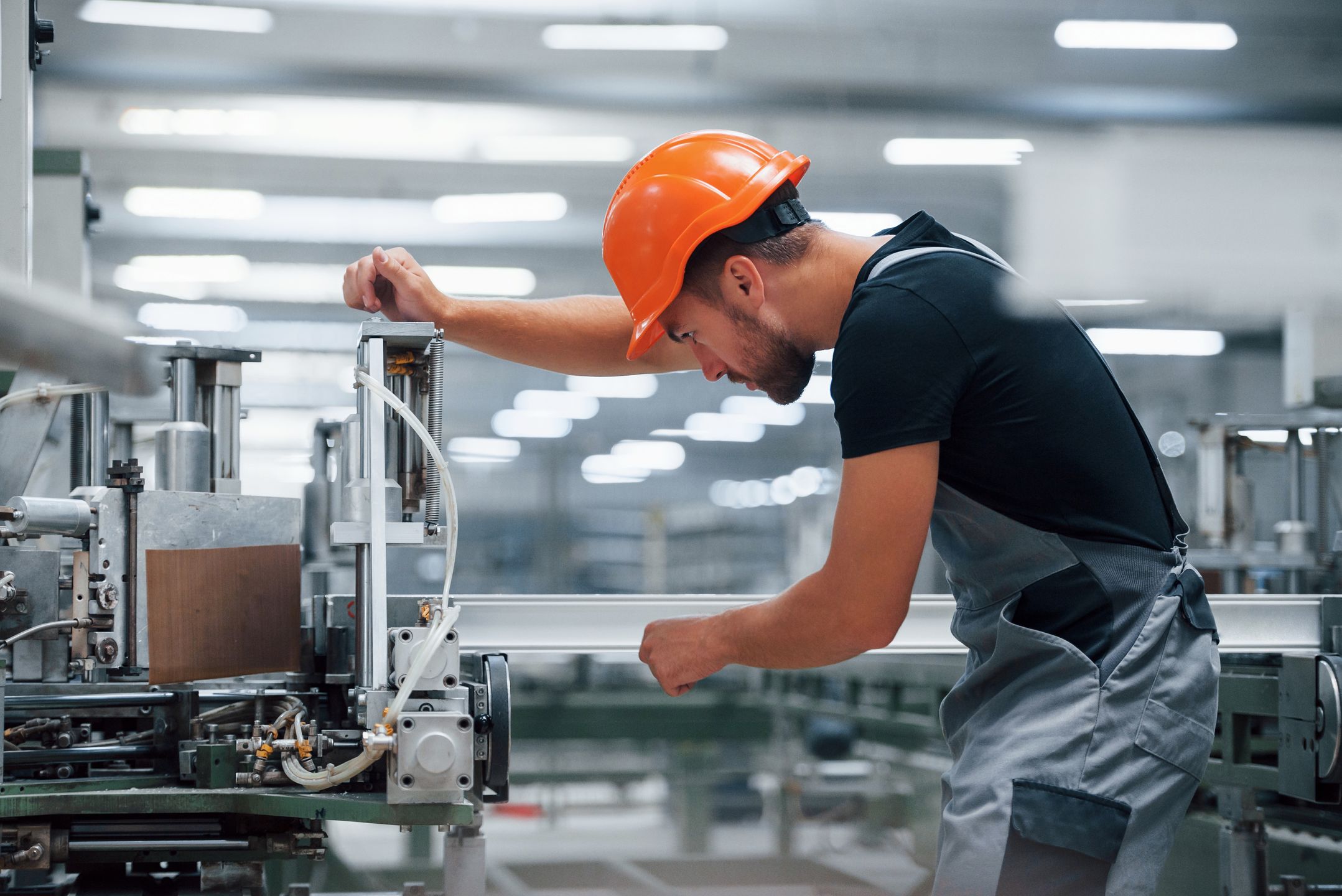 Operator of machine. Industrial worker indoors in factory. Young technician with orange hard hat
Operator of machine. Industrial worker indoors in factory. Young technician with orange hard hat.
holds, window, glass, protective, helmet, orange, color, manufacturing, indoors, safety, one, person, man, male, guy, caucasian, ethnicity, control, equipment, factory, generation, industry, manual, work, job, production, occupation, technology, business, distribution, logistic, manager, professional, young, craftsman, employee, hardhat, inspection, maintenance, operator, progress, white, stock, plan, warehouse, alone, export, productivity, organization, supply