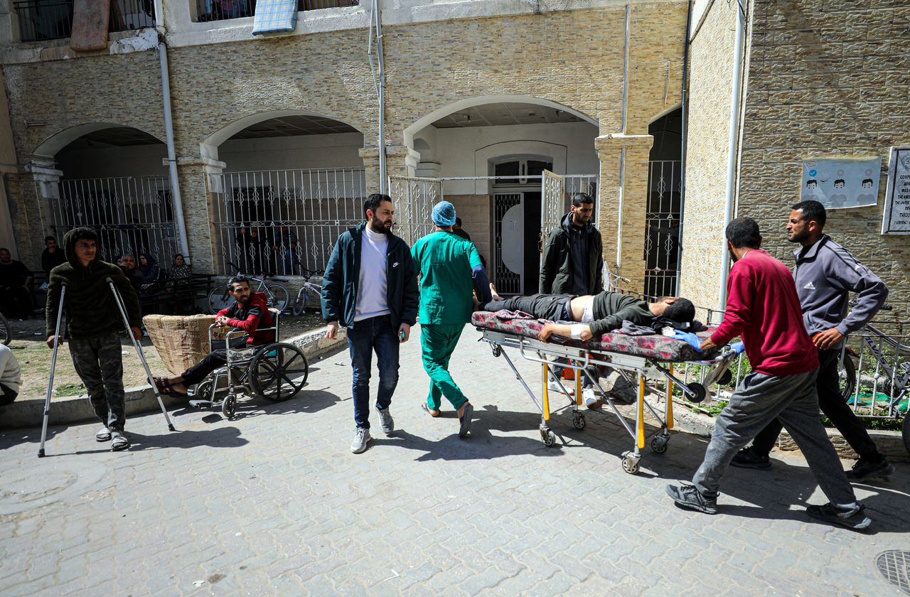 GAZA CITY, GAZA - MARCH 25: Wounded Palestinians are taken to al-Ahli Baptist Hospital after Israeli forces hit Palestinians who were waiting aid trucks in the El-Shujaiya Neighborhood of the Northern Gaza Strip, Gaza on March 25, 2023 (Photo by Dawoud Abo Alkas/Anadolu via Getty Images)