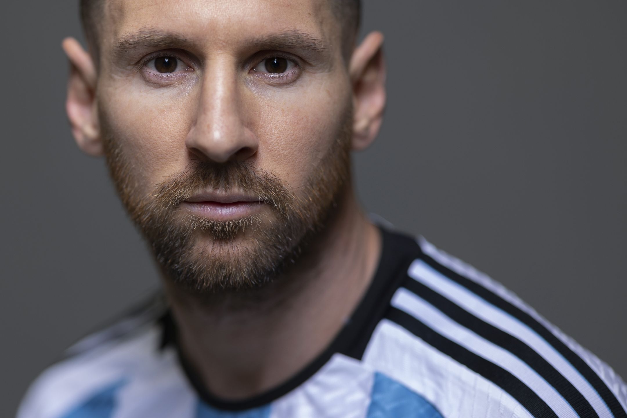 DOHA, QATAR - NOVEMBER 19: Lionel Messi of Argentina poses during the official FIFA World Cup Qatar 2022 portrait session at  on November 19, 2022 in Doha, Qatar. (Photo by Hector Vivas - FIFA/FIFA via Getty Images)