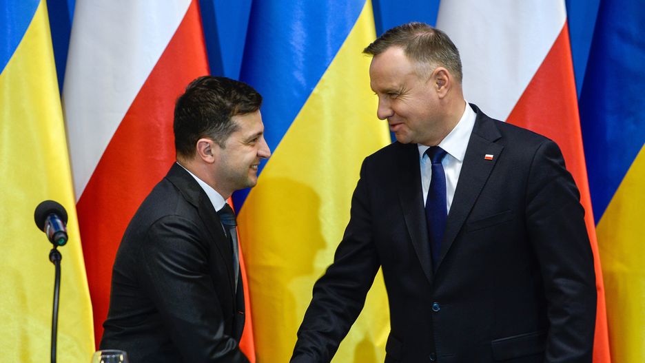 OSWIECIM, POLAND - JANUARY 27: President of Ukraine, Volodymyr Zelenski and the President of Poland, Andrzej Duda shake hands after speaking to the media  during the 75th Anniversary of Auschwitz Liberation on January 27, 2020 in Oswiecim, Poland. International leaders as well as approximately 200 survivors and their families are gathering today at Auschwitz today to commemorate the 75th anniversary of the camp's liberation. The Nazis killed an estimated one million people at the camp during the World War II occupation of Poland by Nazi Germany.(Photo by Omar Marques/Getty Images)