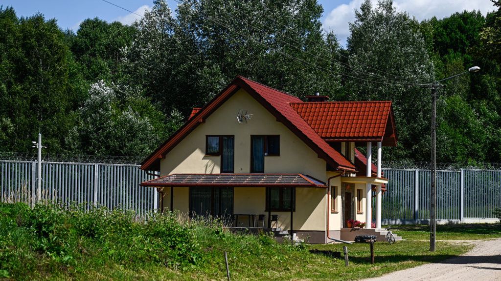 Poland Strengthens Border Enforcement Near Belarus Amid Wagner Concerns
TOLCZE, POLAND - JULY 09: A private house is pictured just metters away from the Polish Belarusian border wall on July 09, 2023 in Tolcze, Poland. Last week, the Polish government announced it was sending 500 counterterrorism police to the border with Belarus amid fears that the Wagner Group, the Russian private army, would be relocating to Belarus following its recent aborted mutiny in Russia. Poland has already stationed 5,000 security guards and 2,000 soldiers on the border, with the country's interior minister calling it a "tense situation." Beyond the Wagner worries, the border also remains a popular route for migrants looking to enter the European Union. In 2021, the Belarusian government tried to weaponize this trend by bringing thousands of migrants - mostly from the Middle East - to the country's borders with Poland and Lithuania, creating a crisis at their border crossings. (Photo by Omar Marques/Getty Images)
Omar Marques