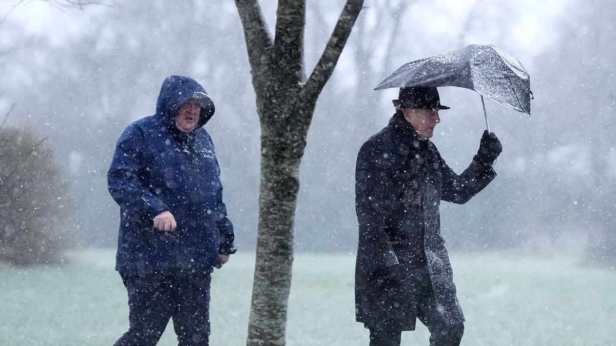 Racegoers in the snow at Naas Racecourse in County Kildare, Ireland. Picture date: Sunday January 5, 2024. (Photo by Niall Carson/PA Images via Getty Images)