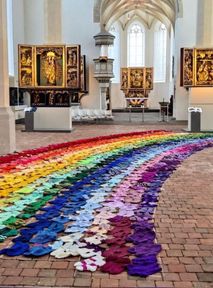 Rainbow made of socks in Germany’s Kamenz church. Unique purpose