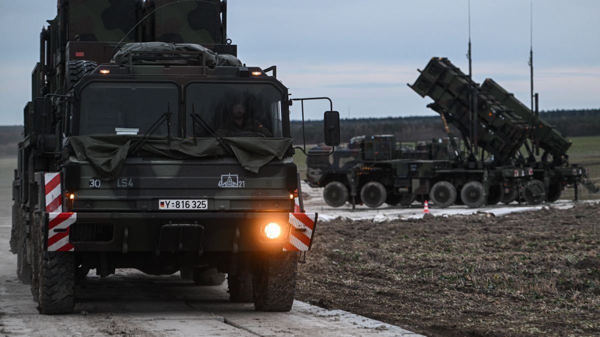 ZAMOSC, POLAND - FEBRUARY 18: A German soldier drives a M983 HEMTT carrying a Patriot launcher module part of the US made MIM-104 Patriot surface-to-air missile (SAM) system on a open field on February 18, 2023 in Zamosc, Poland. The German armed forces deployed Patriots batteries to their NATO neighbor, after a missile explosion in Przewodow, which previous investigation suggests that came from Ukrainian air defense, killed two civilians. Since Russia's large scale military attack on Ukraine on February 24, 2022 more than 9.7 million refugees from Ukraine crossed the Polish borders to escape the conflict, with 1.4 million registering in Poland whilst others moved on to other countries. (Photo by Omar Marques/Getty Images)