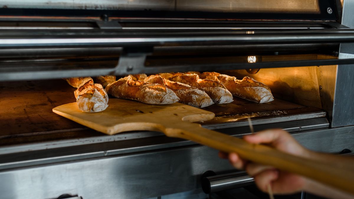 Close up of baker is taking off from oven the french baguette bread with wood peel at baking manufacture factory. French baguette bread bakery factory concept.
wood, peel, dough, bread, store, manufacture, bakery, baker, french, baguette, bakery products, bread-baking, cooking, job, products, manufacturing, food industry, oven, bun, profession, bakehouse, professional, business, hot, shelf, production, worker, cap, loaf, factory, bake, flour, food, fresh, close up, wood, peel, dough, bread, store, manufacture, bakery, baker, french, baguette, bakery products, bread-baking, cooking, job, products, manufacturing, food industry, oven, bun, profession, bakehouse, professional, business, hot, shelf, production, worker, cap, loaf, factory, bake, flour, food, fresh, close up