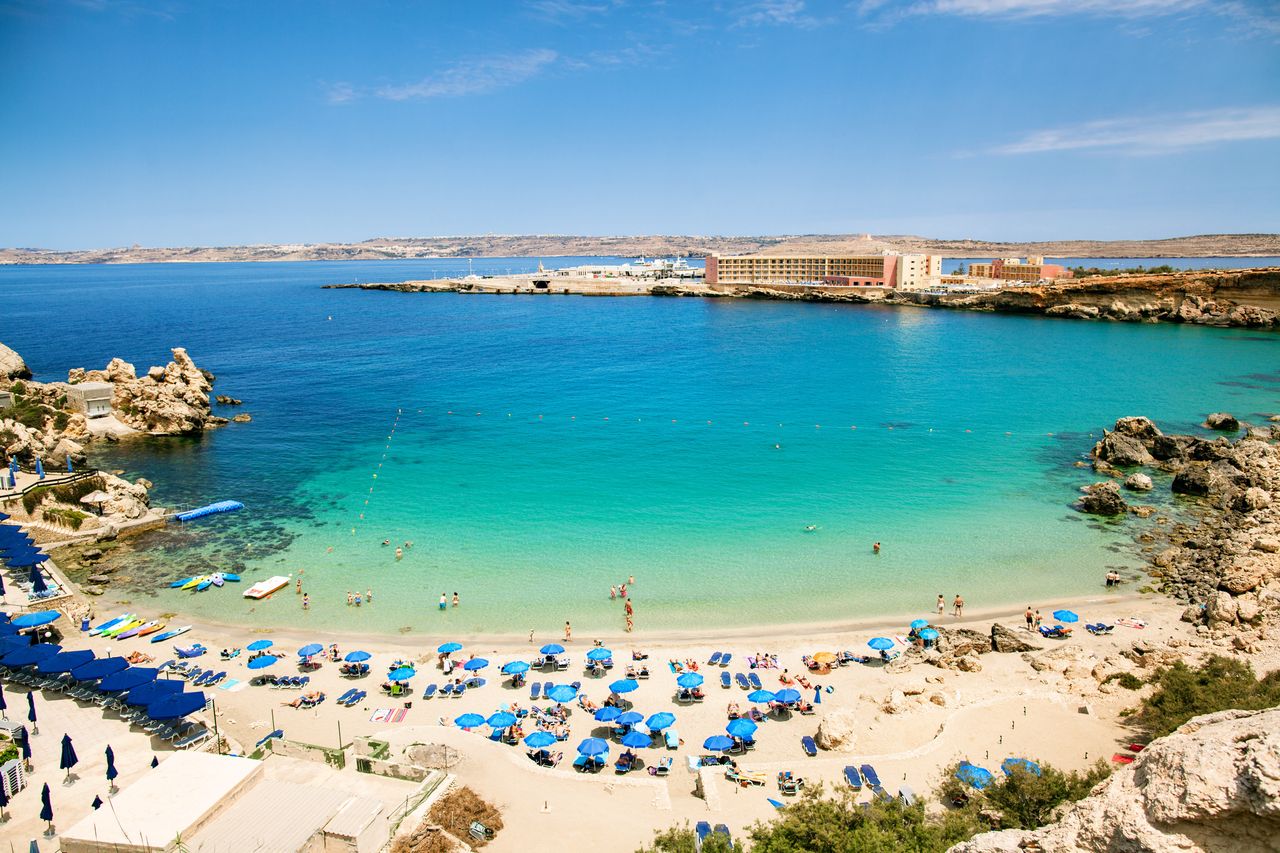 Malta lures with turquoise water.